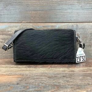 HCC trail boss black hair on hide